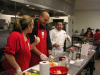 Chef Working With Cooking Class Participants