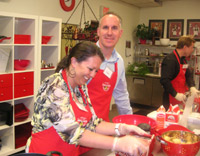 Couple cooking together in cooking class - Suffolk County.