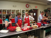 Cooking Class Participants Working Together